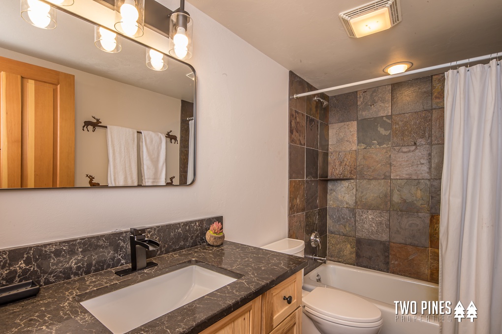 Shared Guest Bathroom with Tub/Shower Duo