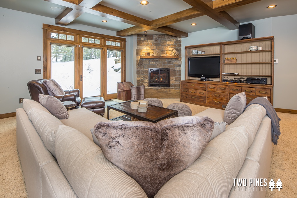 Lower Level Living Area- Large TV and Fireplace