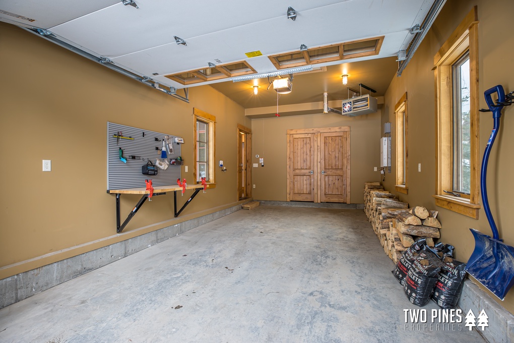 Garage with Tool Bench and Firewood for Guests