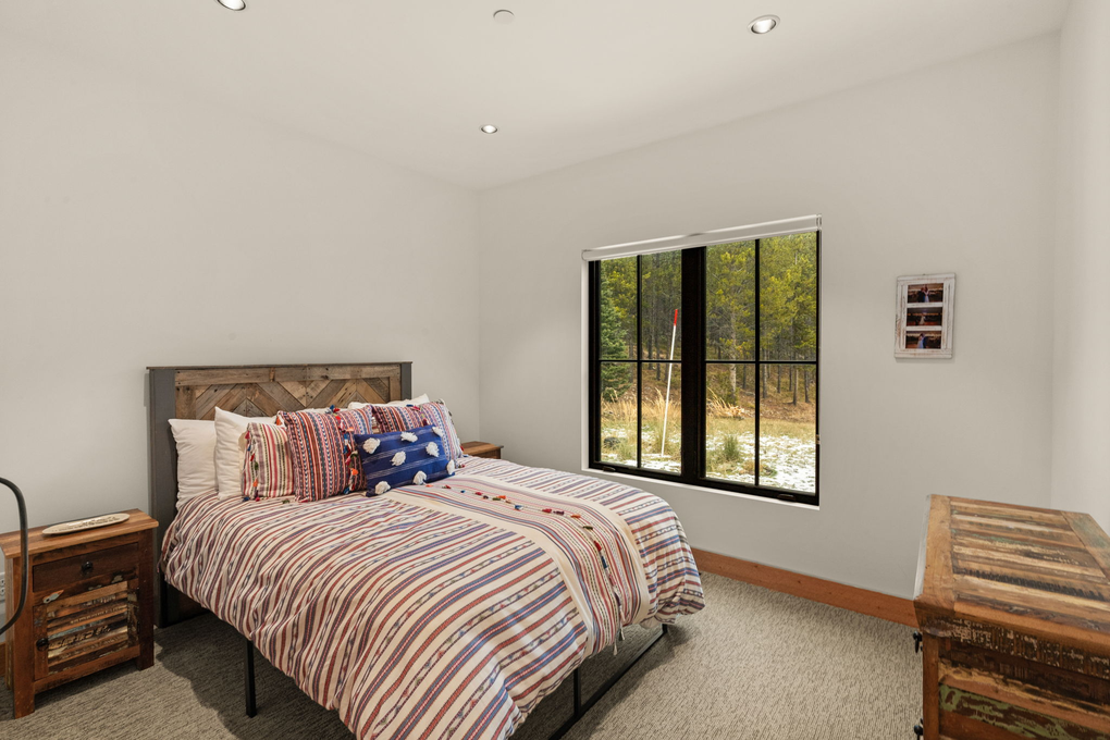 Guest Bedroom 2 - Queen Bed with En-Suite Full Bath (main floor)