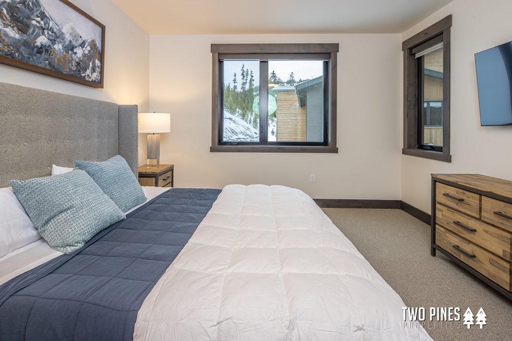 Primary Bedroom with King Bed and Smart TV