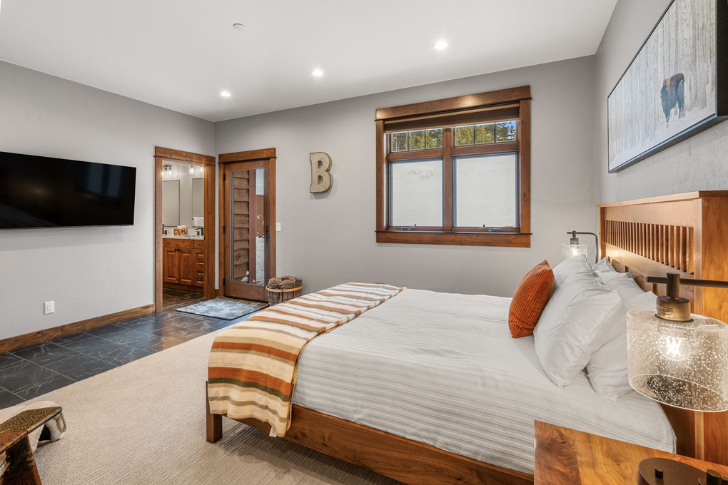 Primary Bedroom w/ En-Suite Full Bath and Hot Tub Access (second floor)