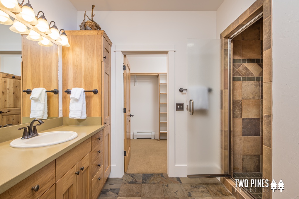 Primary Bathroom with Attached Walk-in Closet