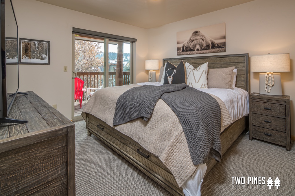 Primary Bedroom with King Bed and Balcony Access