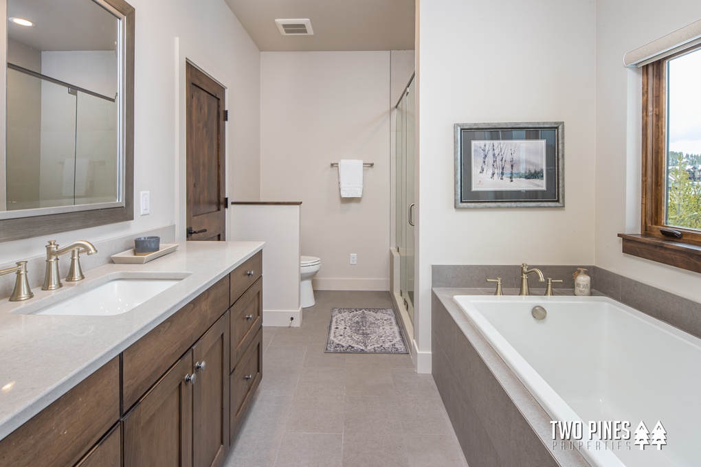 Primary Bathroom En Suite with Oversized Soaking Tub, Dual Vanity and Walk In Shower