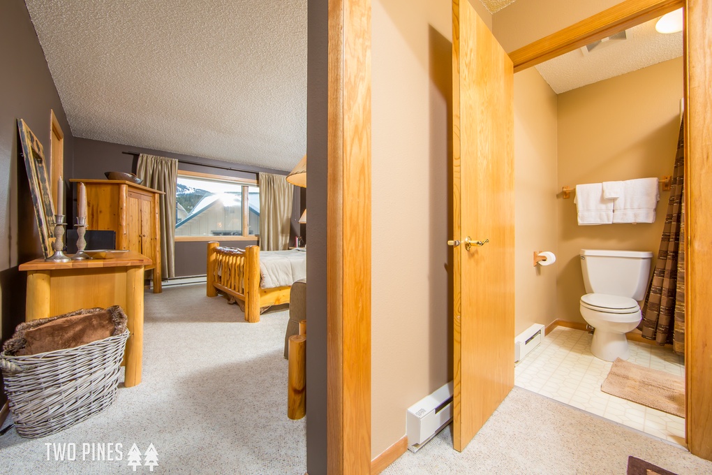 Main Level Guest Bedroom with two twin beds