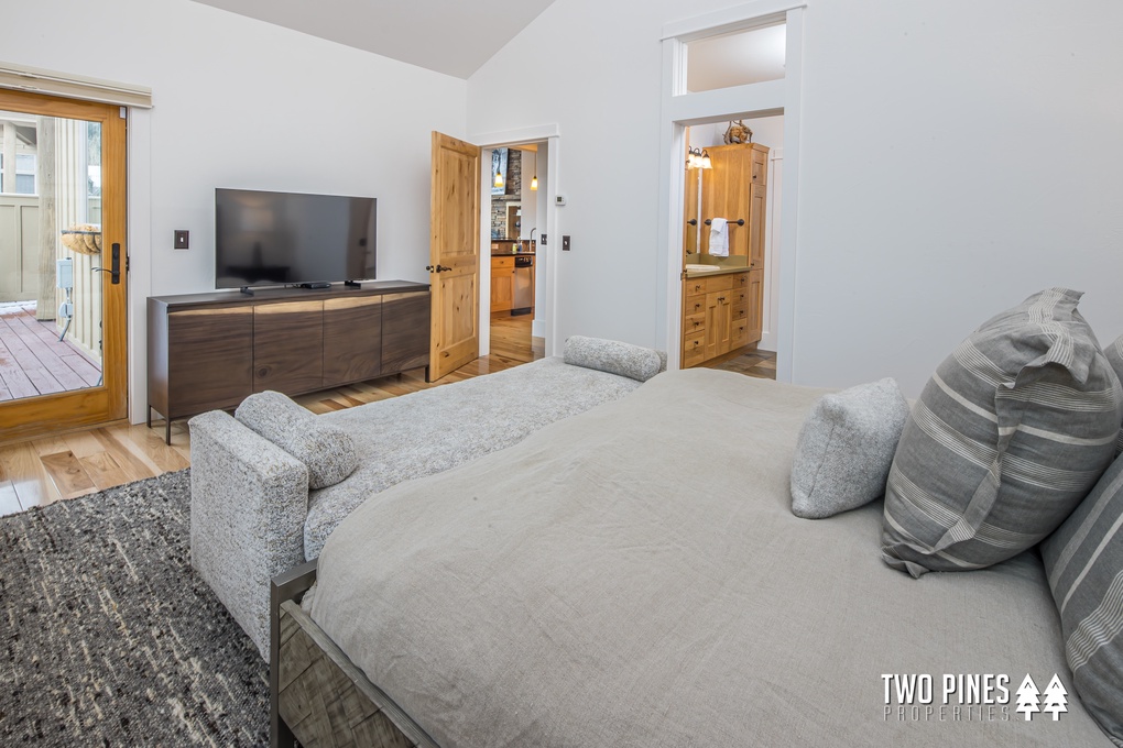 Primary Bedroom with King Bed and Patio Access
