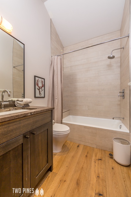 Bunk Room En Suite with a Single Vanity