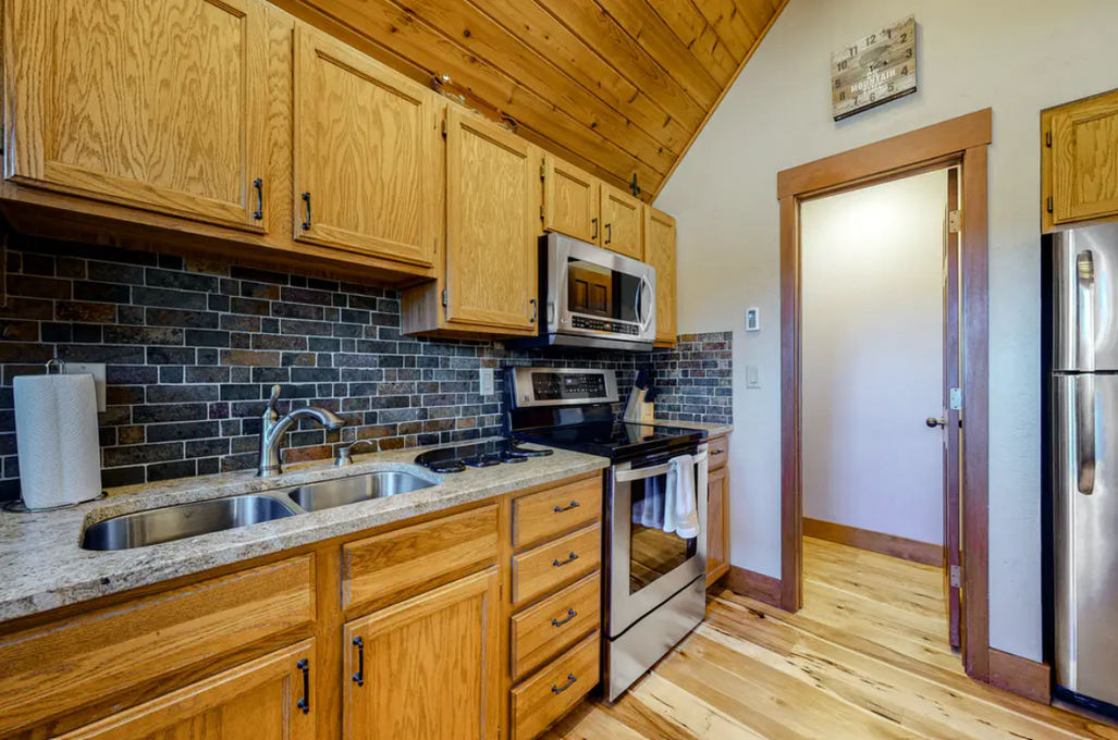 Updated Kitchen with Stainless Steel Appliances and Walk-In Pantry