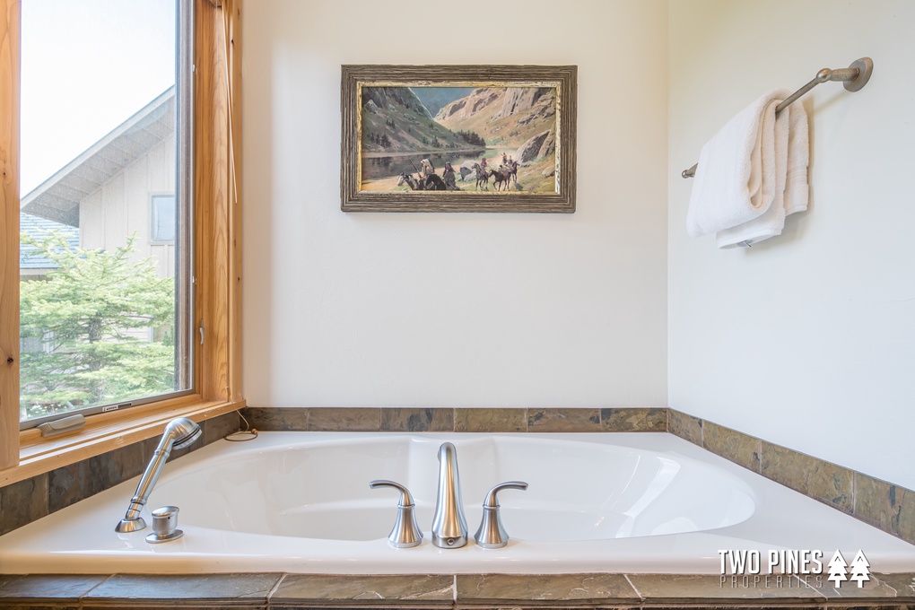 Lower Level Primary En Suite with Soaking Tub and Walk-in Shower