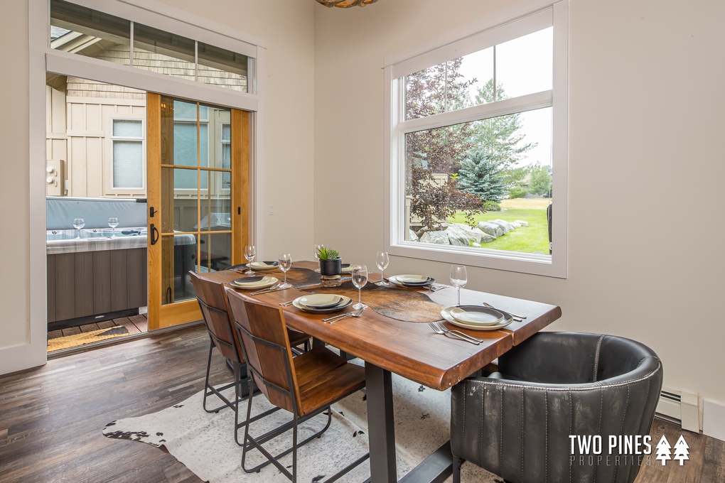 Dining Area with Access to Patio with Private Hot Tub