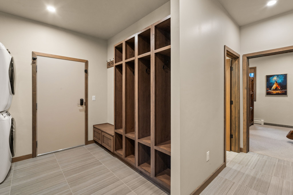 Entryway Mud-room with Washer/Dryer and Storage