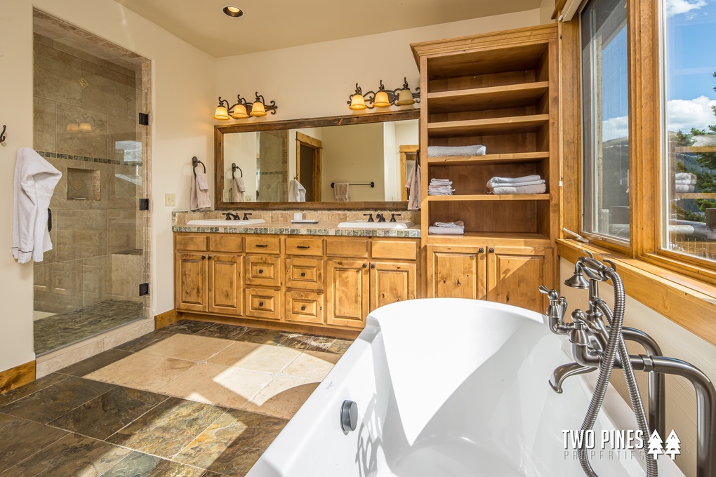 Primary Bathroom Soaking Tub, Dual Vanity, and Walk In Shower