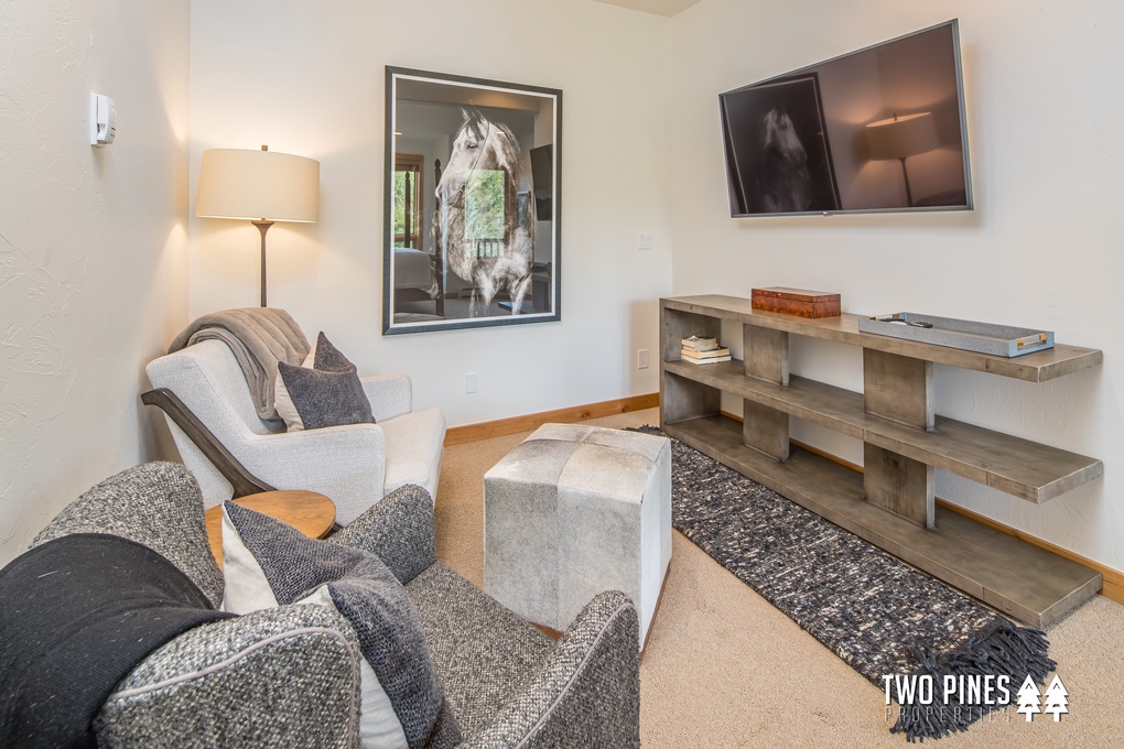 Primary Bedroom Living Area with Flatscreen TV