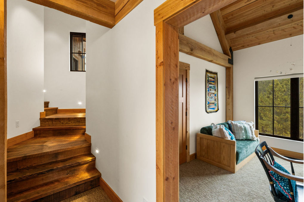 Primary Bedroom w. En-Suite Full Bath, Gas Fireplace, Office and Private Deck (main floor)