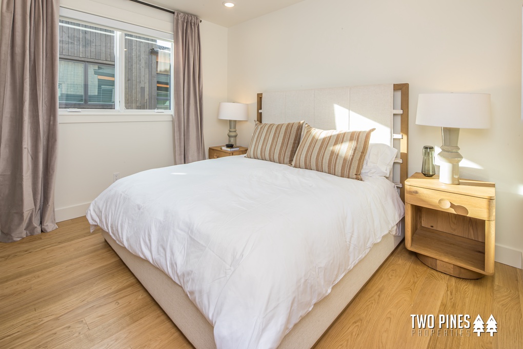 Guest Bedroom with King Sized Bed and Smart TV