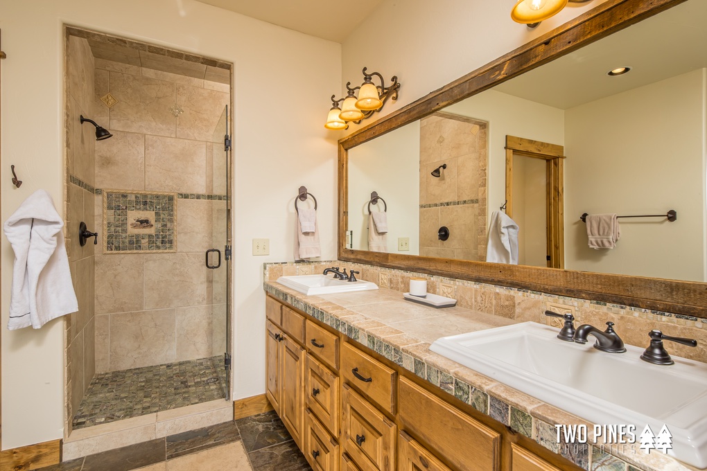 Primary Bathroom Dual Vanity and Walk In Shower