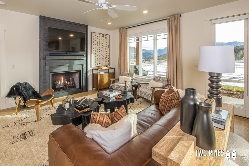 Professionally Decorated Living Room with Gas Fireplace and Smart TV