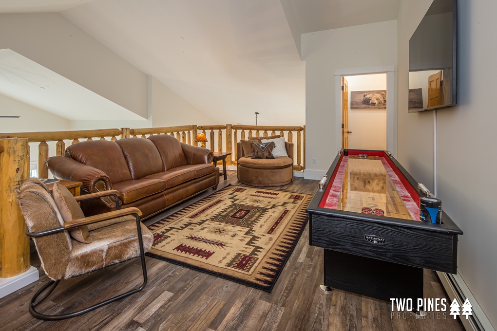 Upstairs Loft with Television, Shuffle Board, and Sofa Bed