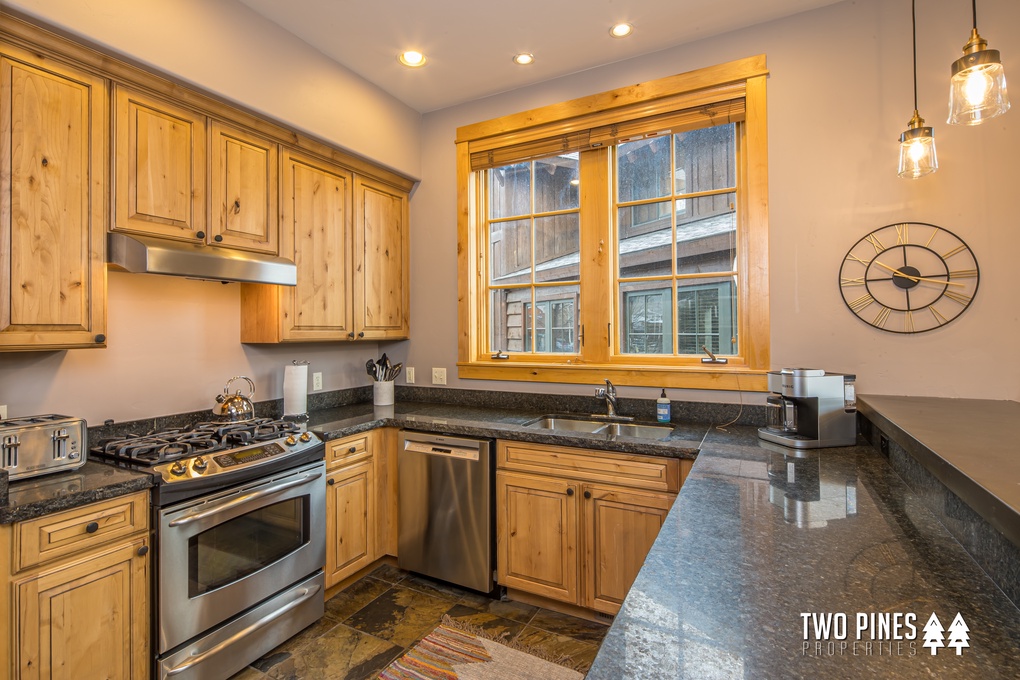 Open Designed Kitchen with Stainless Steel Appliances