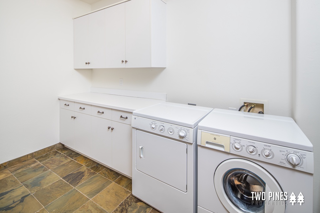 Lower Level Laundry Room with Commercial Washer and Dryer