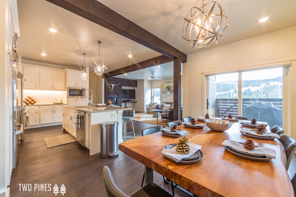 Open floor plan: kitchen, dining, and living