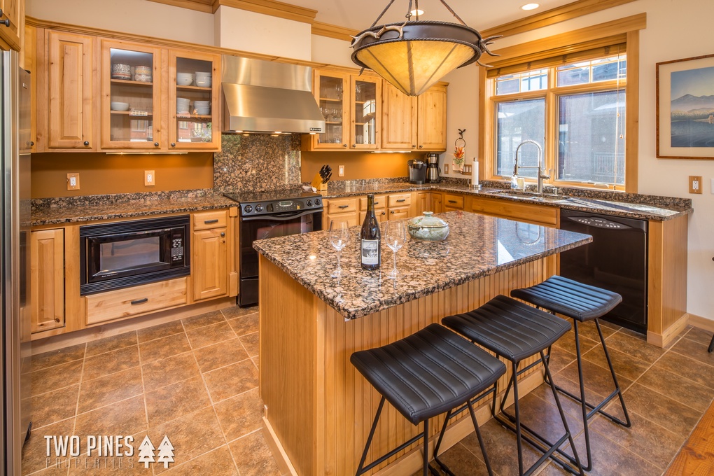 Spacious Kitchen with Granite Counters- Bar Seating for 4