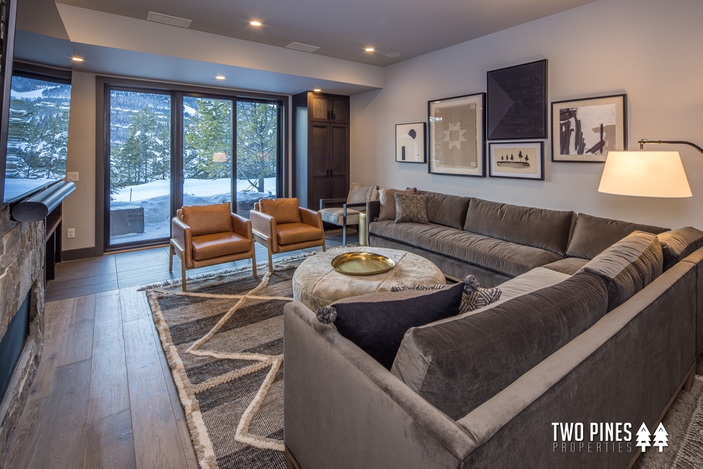 Lower Level Living Room with Large Flat Screen TV, Wood Burning Fireplace, Hot Tub Access to Lower Patio