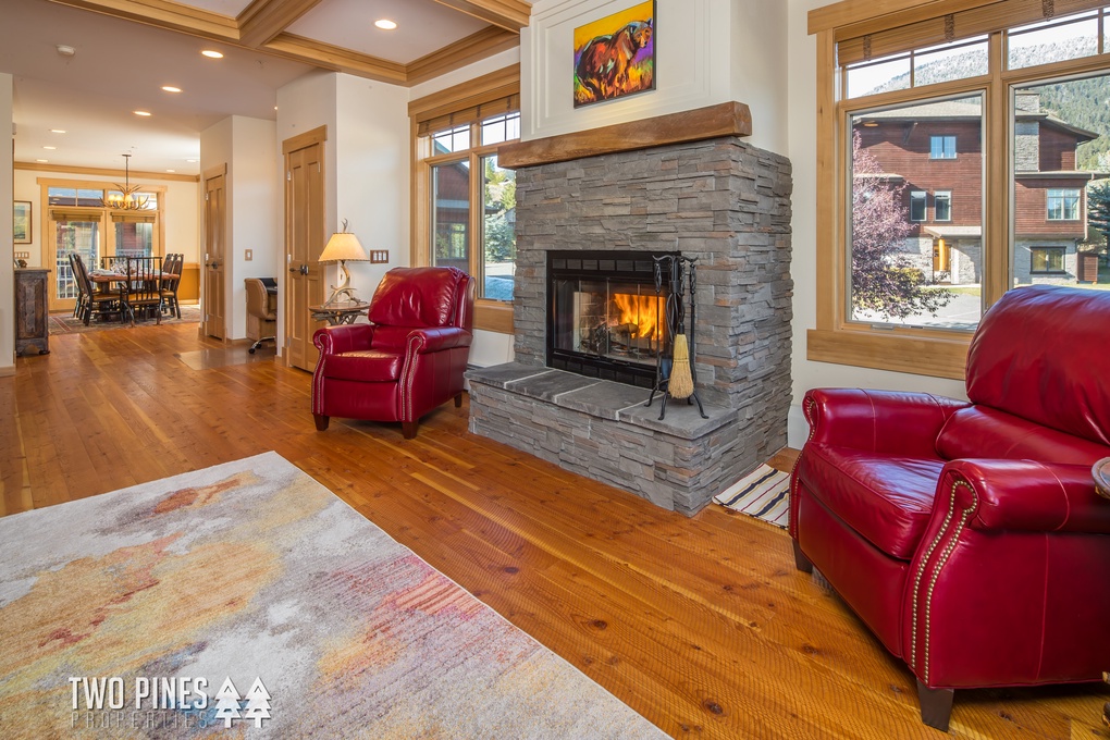 Living Room with Wood Burning Fireplace & Flat Screen TV