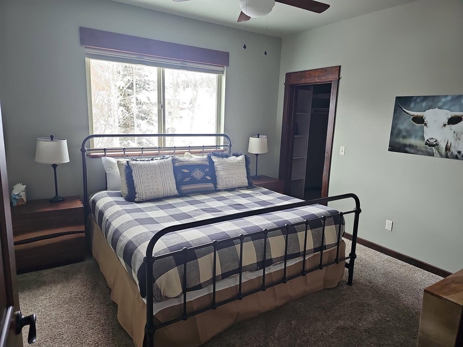 First guest room with king-sized bed