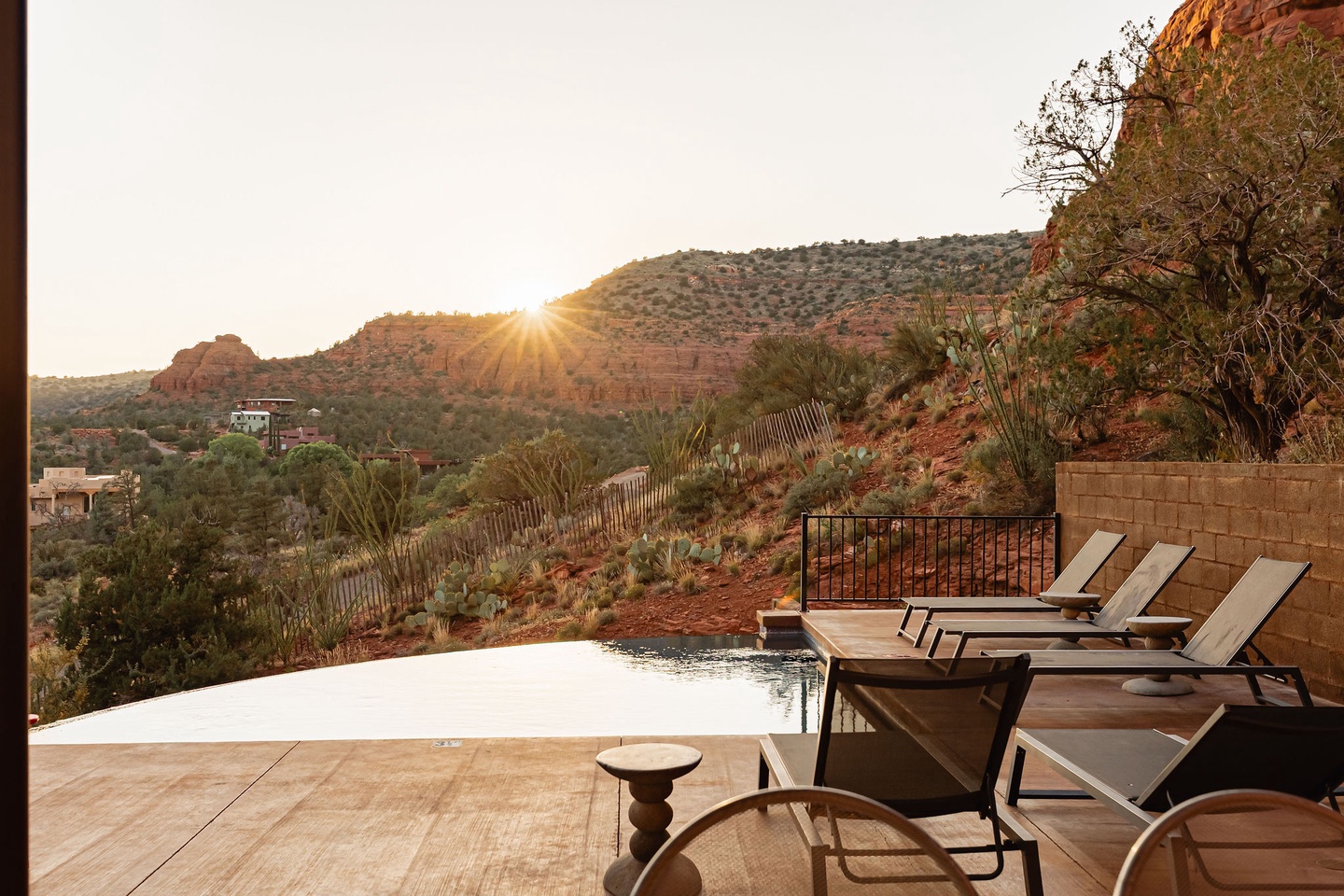 Outdoor lounge space along the heated* pool