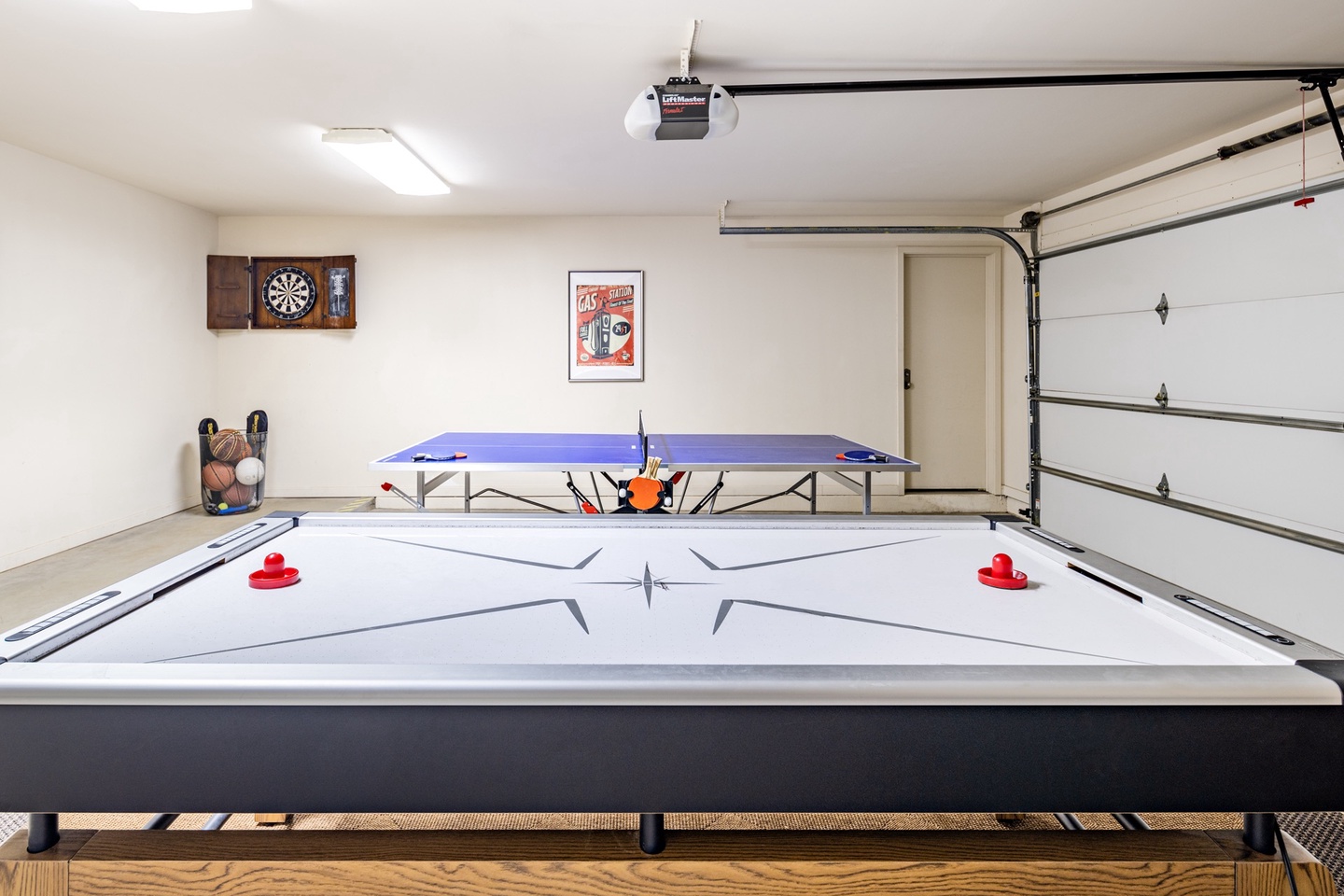 Garage set up for more games. Ping Pong & Air Hockey