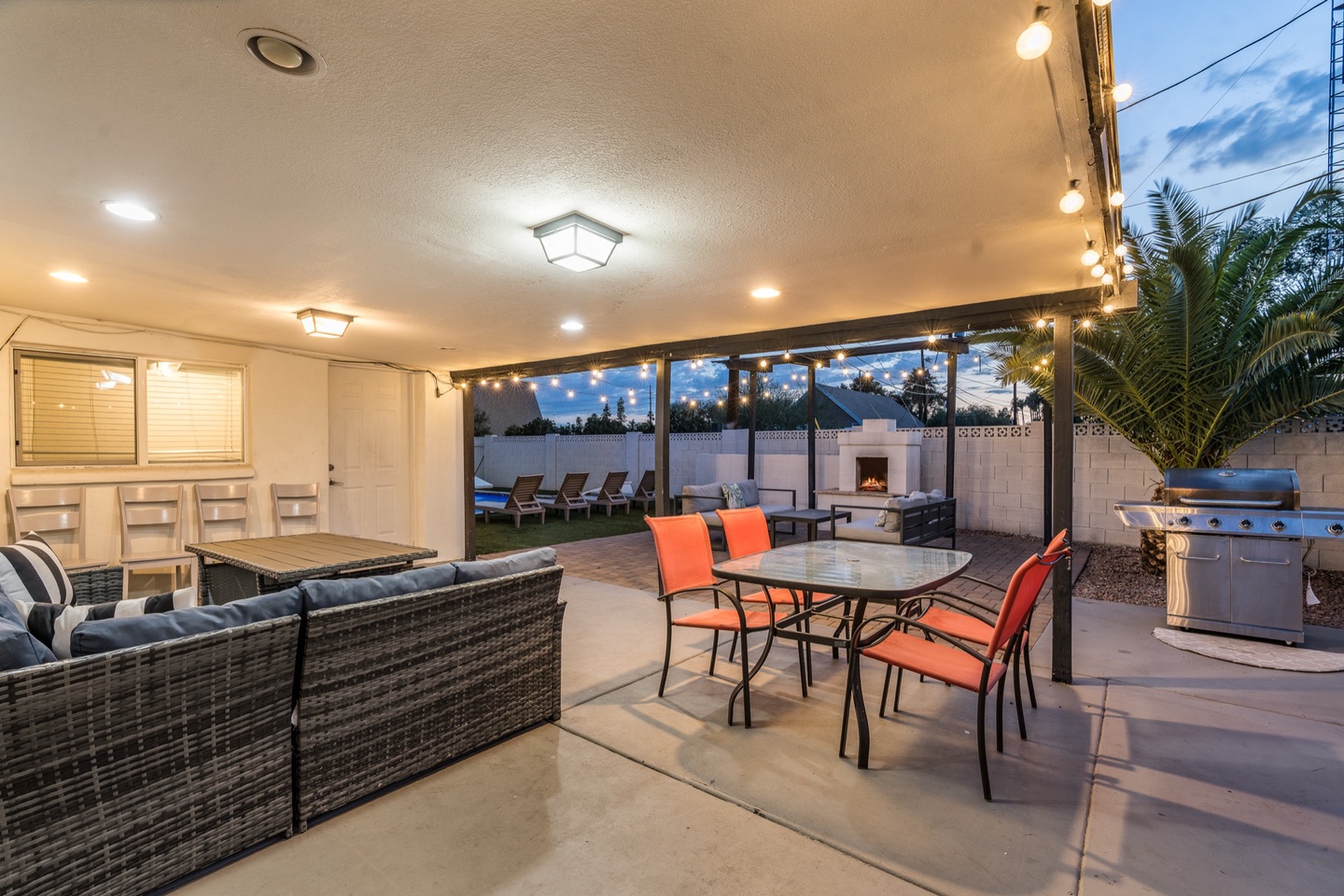 Covered patio with outdoor dining & BBQ