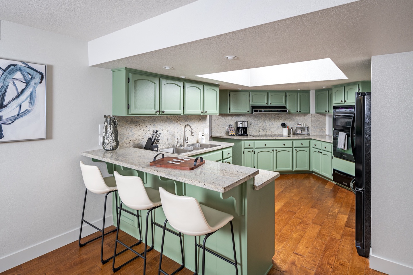 Kitchen area with bar seating