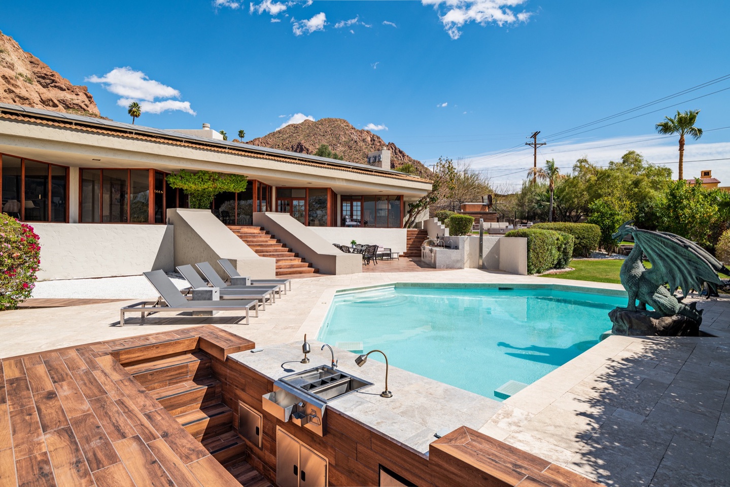 Land the built in cooler with beverages to enjoy pool side