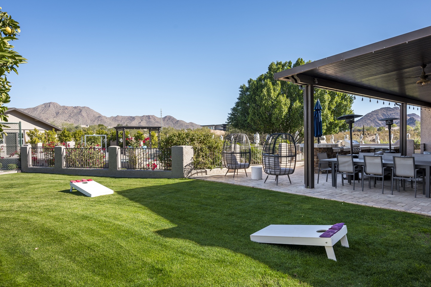 Corn hole in the manicured lawn