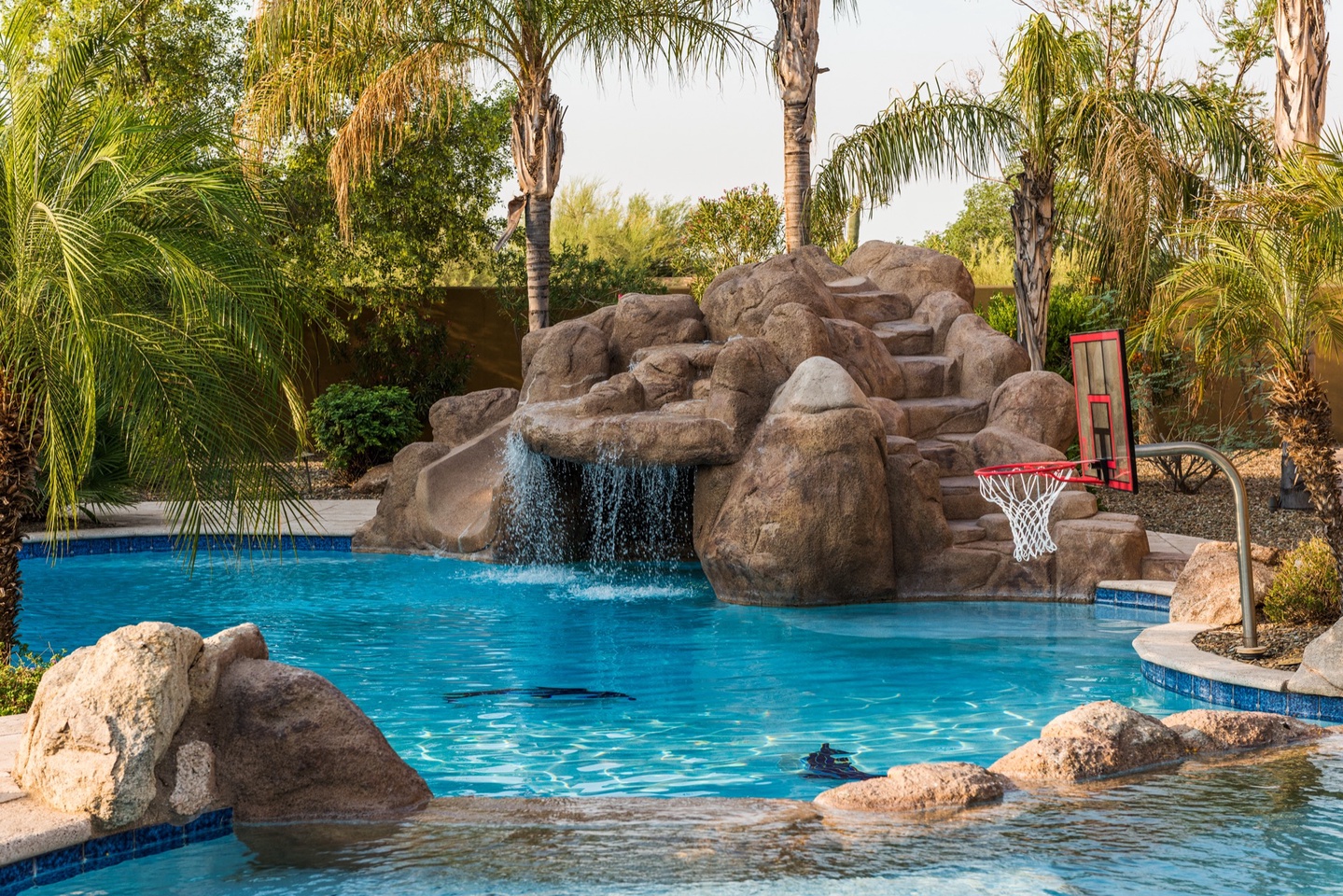 Water slide and grotto under the waterfall