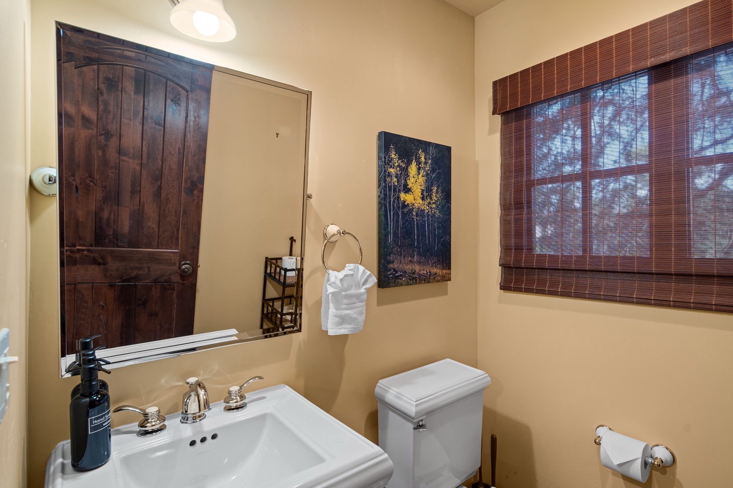 Powder bathroom outside the kitchen