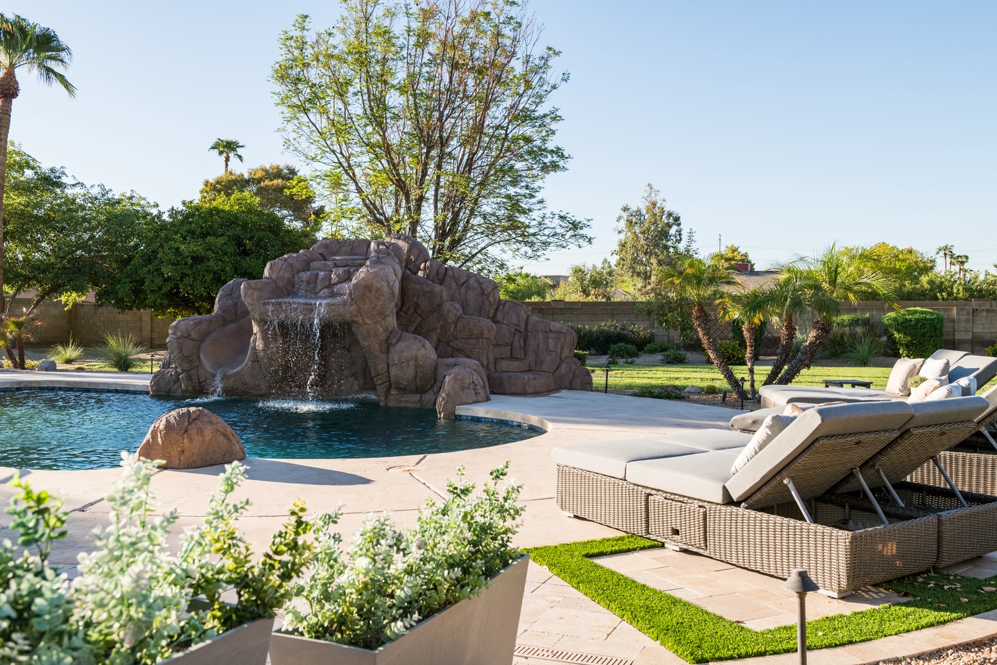 Large slide / waterfall feature in the pool