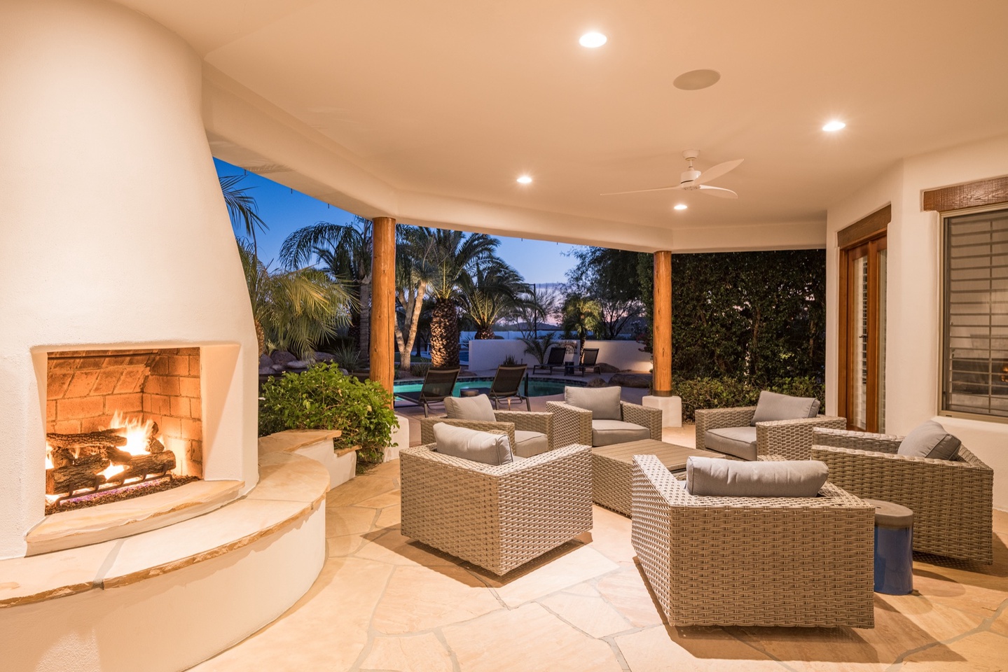 Large covered patio with outdoor fireplace