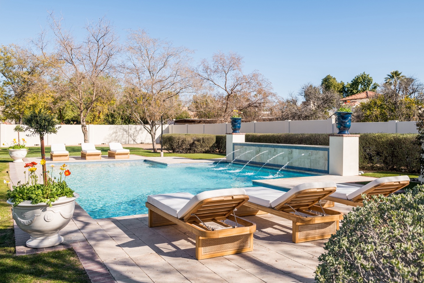 Large heated* pool with comfortable lounge zones