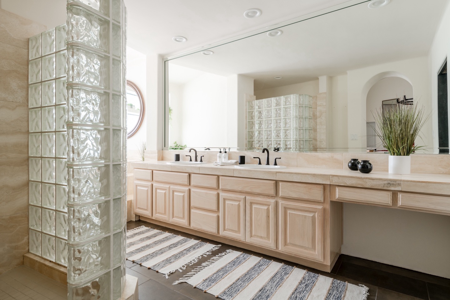 Master bathroom with walk-in shower and elevated bathtub