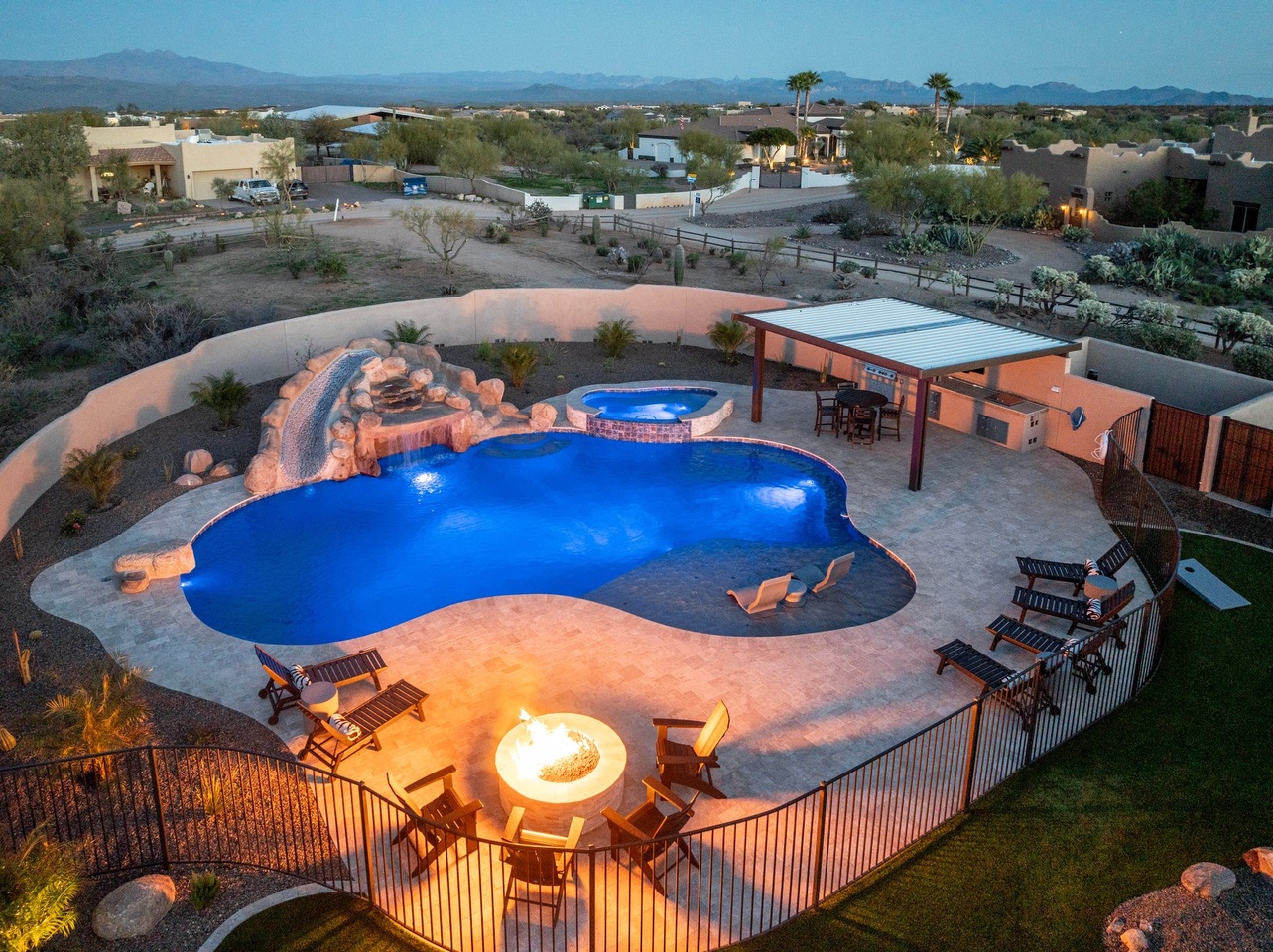 Sit around the fire-pit while the kids swim