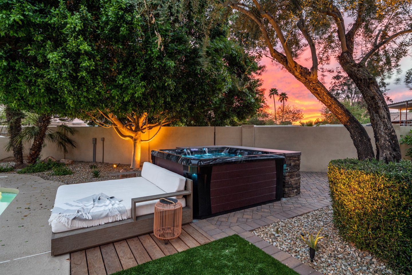 Outdoor spa with lounging couch