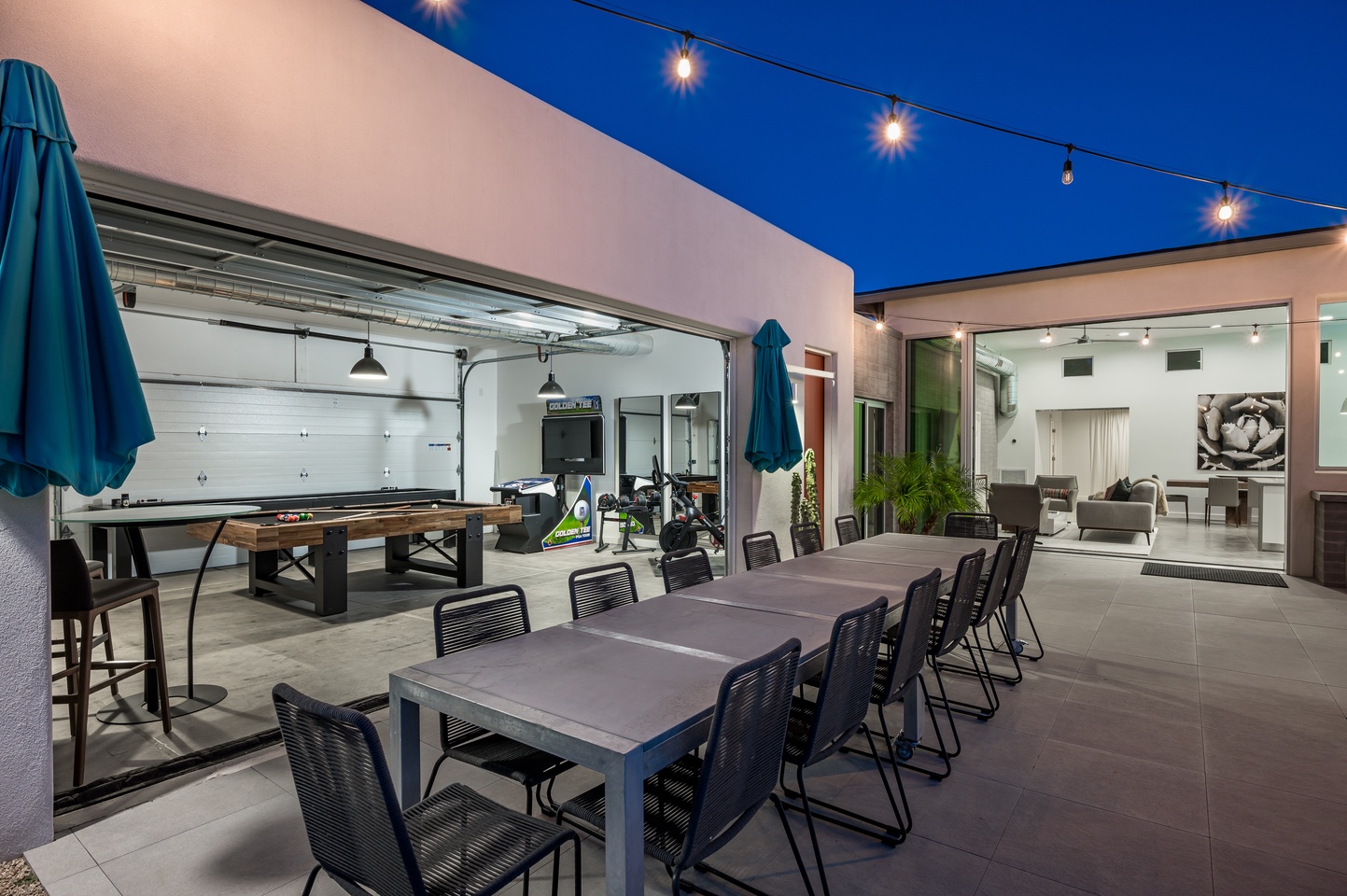 Large outdoor dining space with over head umbrellas