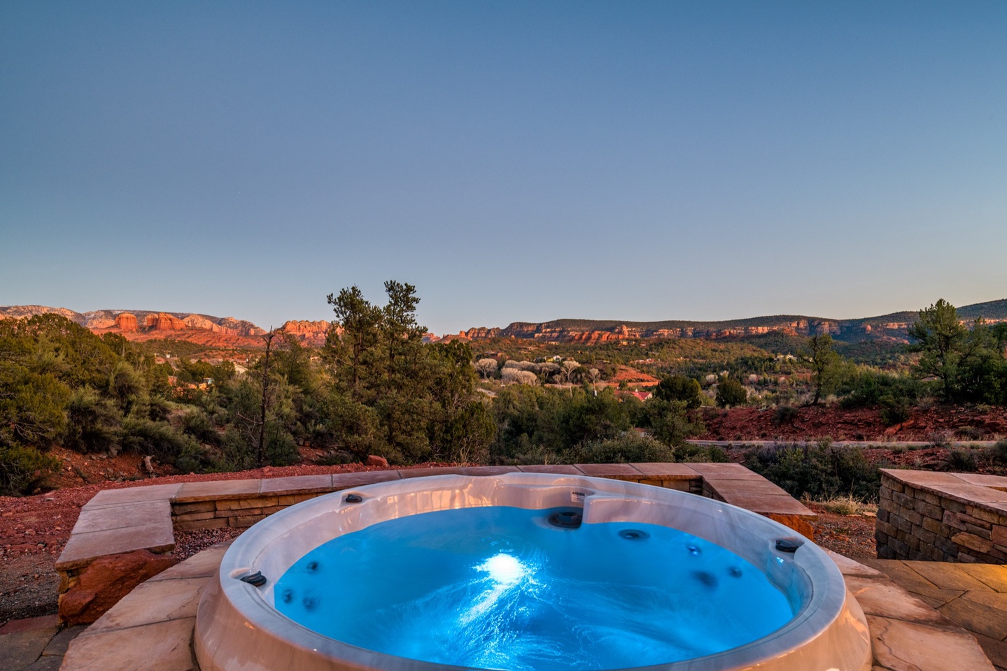 Soak in the spa overlooking the Sedona canyons