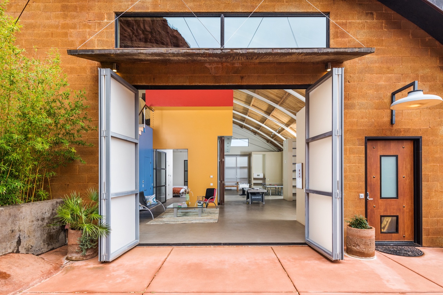 Large doors flowing into the guest studio