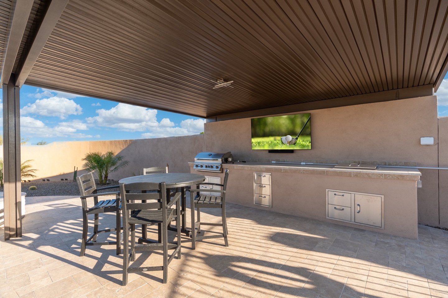Pool side cabana with BBQ station & TV