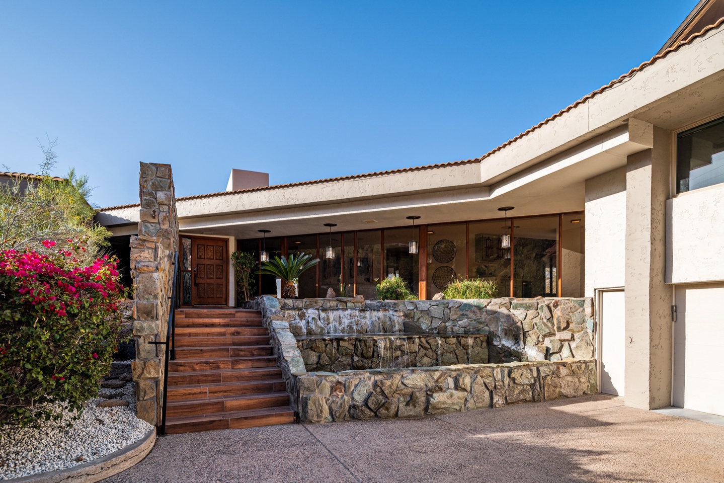 Front entry with a pleasing waterfall