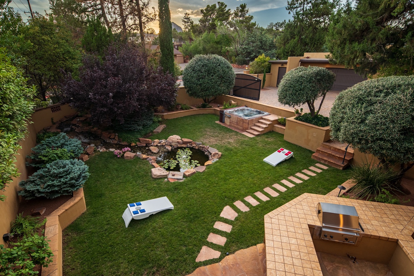 Unwind in the hot tub by the pond